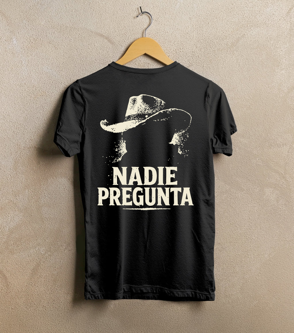 Nadie Pregunta Tee (The town behind the stories.)